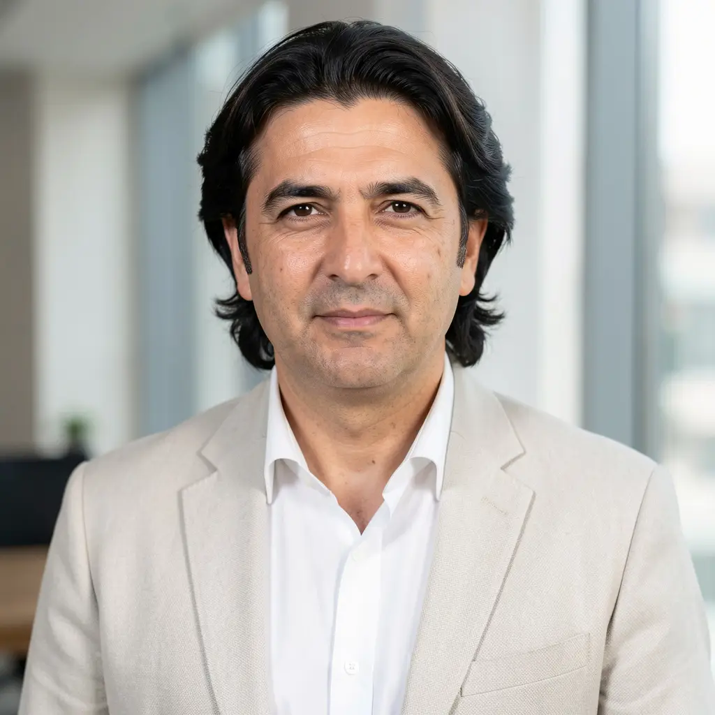 freepik__portrait-of-a-mid40s-turkish-man-with-longer-dark-__28520